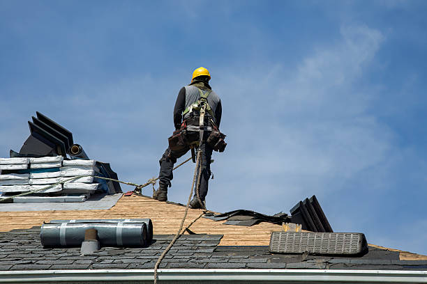 Professional Roofing technician working in Council, NC